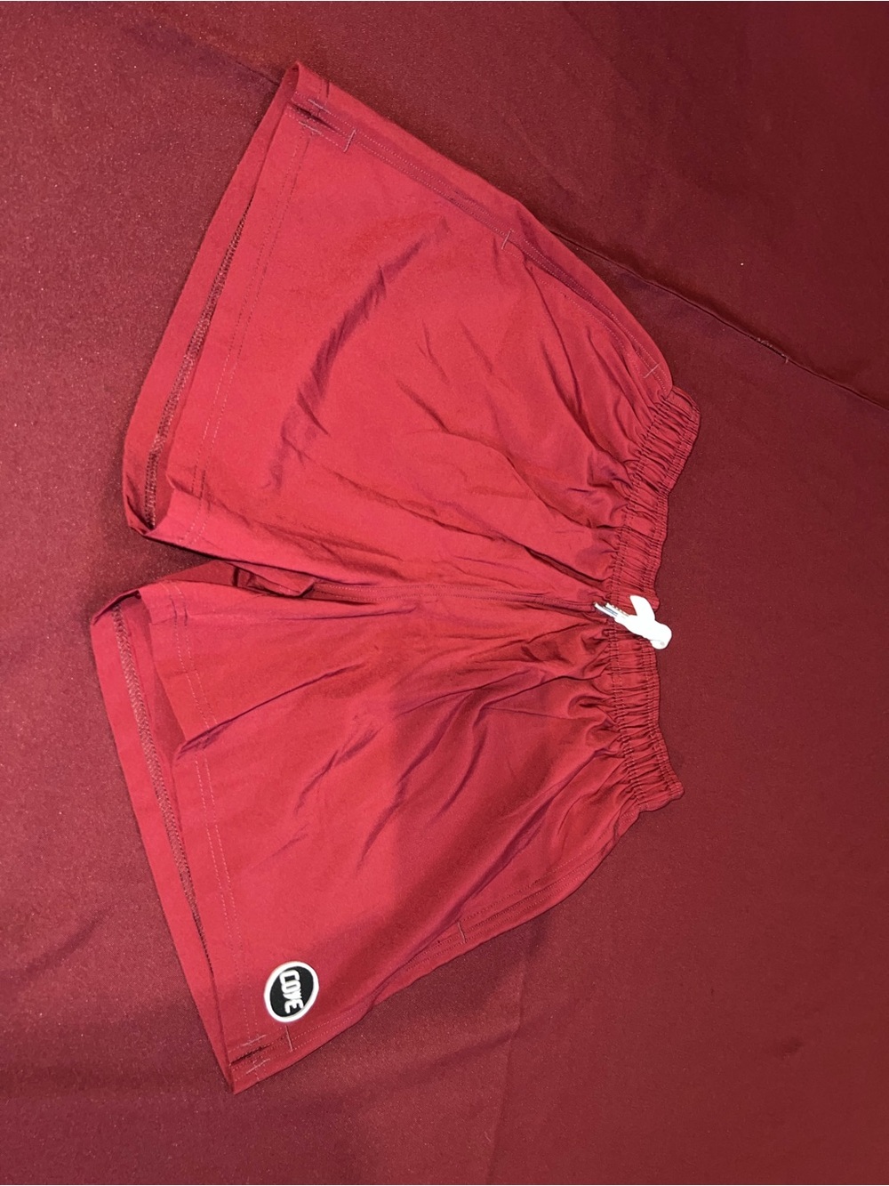Cove Brand Burgundy color swim shorts size 32